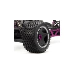 Dirt buster block tire s compound on black wheel