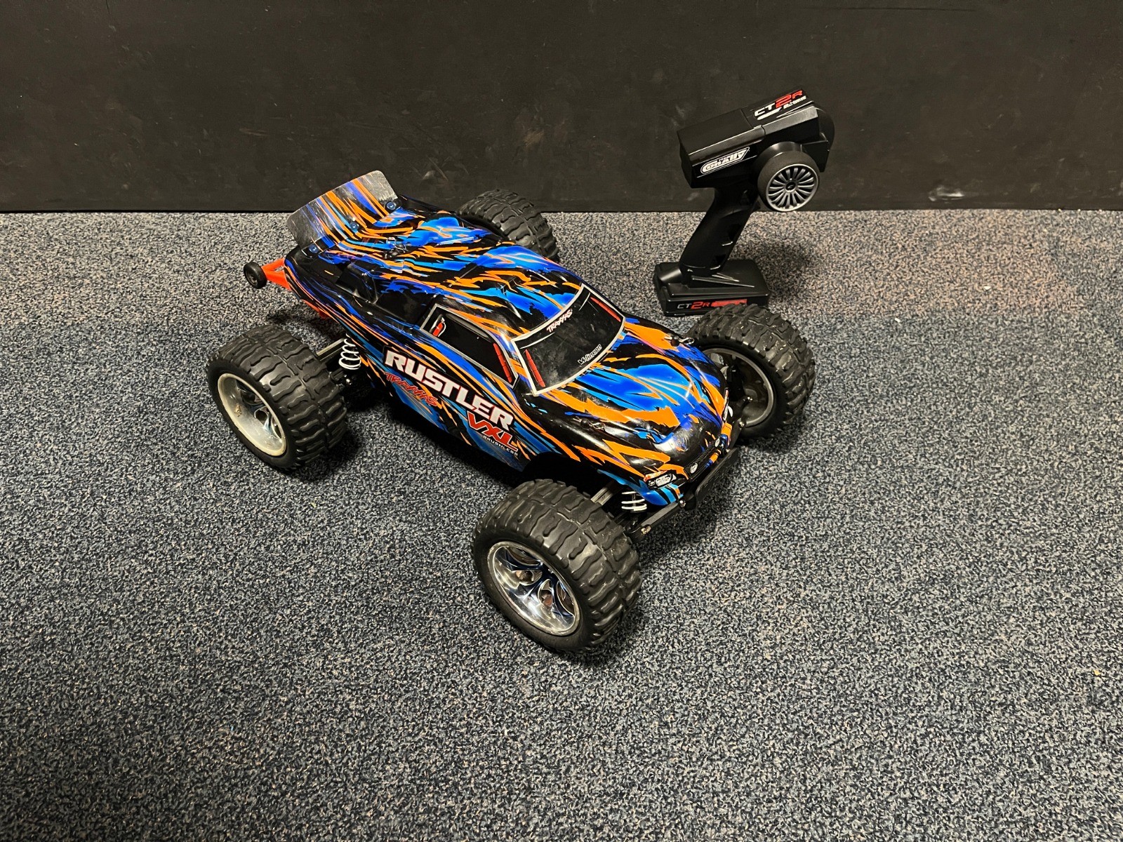 Tweedehands Traxxas Rustler 2WD met brushless combo - Blauw/Oranje afbeelding